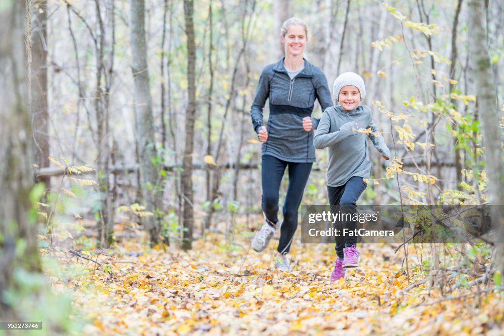 Mom Run Mom And Daughter Running High-Res Stock Photo - Getty Images