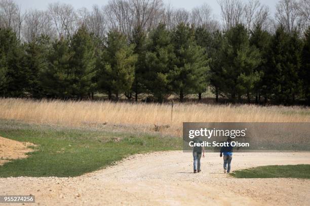 Sophomores Meirick Huffman and Ashlynn Brock, who are dating and both members of the Osage High School trap team leave the range after competing in a...