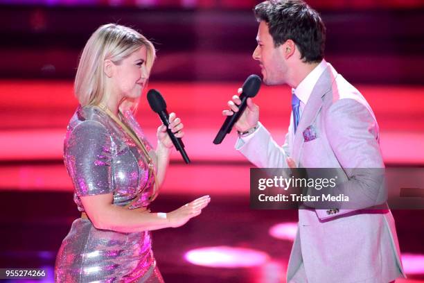 Beatrice Egli and Yannick Bovy during the tv show 'Willkommen bei Carmen Nebel' at Sachsen-Arena on May 5, 2018 in Riesa, Germany.