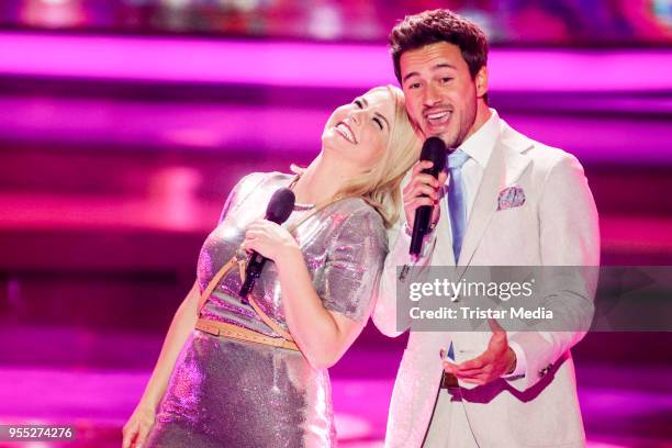 Beatrice Egli and Yannick Bovy during the tv show 'Willkommen bei Carmen Nebel' at Sachsen-Arena on May 5, 2018 in Riesa, Germany.