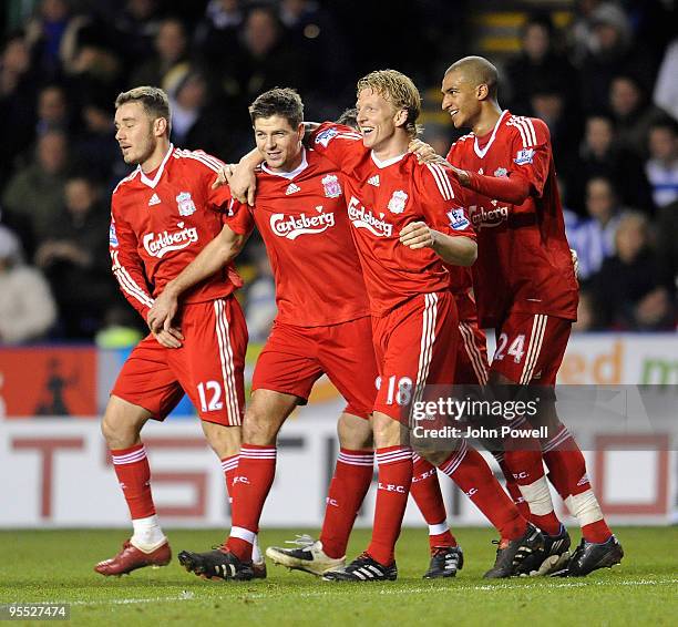 Steven Gerrard of Liverpool celebrates with teammates Dirk Kuyt, Fabio Aurelio and David N'Gog after scoring a goal during the FA Cup 3rd round match...