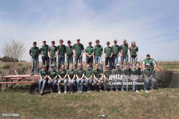 Students from the Osage High School trap team pose for a picture following a match at the Mitchell County Trap Range on May 5, 2018 in Osage, Iowa....