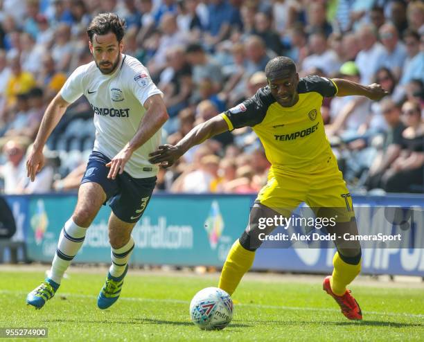 Preston North End's Greg Cunningham goes past Burton Albion's Marvin Sordell during the Sky Bet Championship match between Preston North End and...