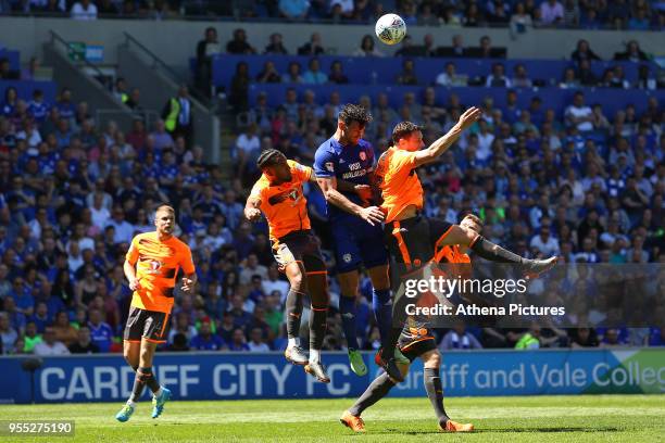 Sean Morrison of Cardiff City contends with the reading defence during the Sky Bet Championship match between Cardiff City and Reading at The Cardiff...