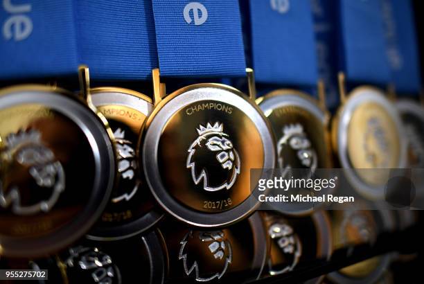 View of the premier league winners medals prior to the Premier League match between Manchester City and Huddersfield Town at Etihad Stadium on May 6,...