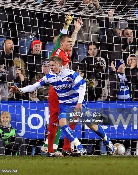 Simon Church of Reading celebrates after scoring a goal against Liverpool during the FA Cup 3rd round match between Reading and Liverpool at the...