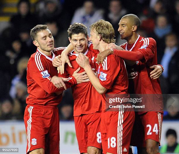 Steven Gerrard of Liverpool celebrates his goal with Dirk Kuyt, Fabio Aurelio and David N'Gog during the FA Cup 3rd round match between Reading and...
