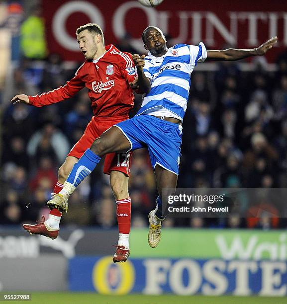 Fabio Aurelio of Liverpool competes for a header during the FA Cup 3rd round match between Reading and Liverpool at the Madejski Stadium, on January...