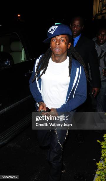 Lil Wayne attends a party presented by Bartley International in association with the 400 Club at Play Nightclub on January 1, 2010 in Miami Beach,...