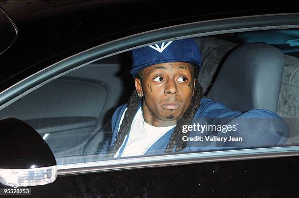 Lil Wayne attend a party presented by Bartley International in association with the 400 Club at Play Nightclub on January 1, 2010 in Miami Beach,...