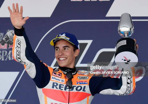 First placed Repsol Honda Team's Spanish rider Marc Marquez celebrates on the podium after the MotoGP race of the Spanish Grand Prix at the Jerez...