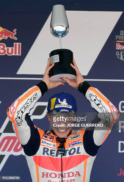 First placed Repsol Honda Team's Spanish rider Marc Marquez celebrates on the podium after the MotoGP race of the Spanish Grand Prix at the Jerez...