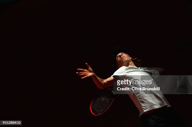 Denis Shapovalov of Canada serves against Tennys Sandgren of the United States in their first round match during day two of the Mutua Madrid Open...
