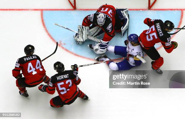 Curtis McElhinney, goaltender of Canada tends net against Woosing Park of Korea after the 2018 IIHF Ice Hockey World Championship group stage game...