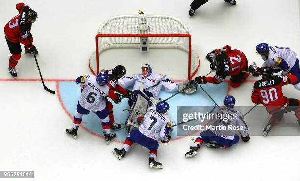 Matt Dalton, goaltender of Korea tends net against Joshua Bailey of Canada during the 2018 IIHF Ice Hockey World Championship group stage game...