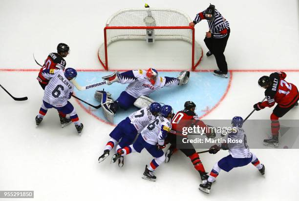 Matt Dalton, goaltender of Korea tends net against Joshua Bailey of Canada during the 2018 IIHF Ice Hockey World Championship group stage game...