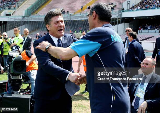 Coach of SSC Napoli Maurizio Sarri greets coach of Torino FC Walter Mazzarri during the serie A match between SSC Napoli and Torino FC at Stadio San...