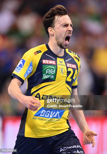 Patrick Groetzki of Rhein-Neckar celebrates during the final of the DKB Handball Bundesliga Final Four between Hannover and Rhein-Neckar Loewen at...