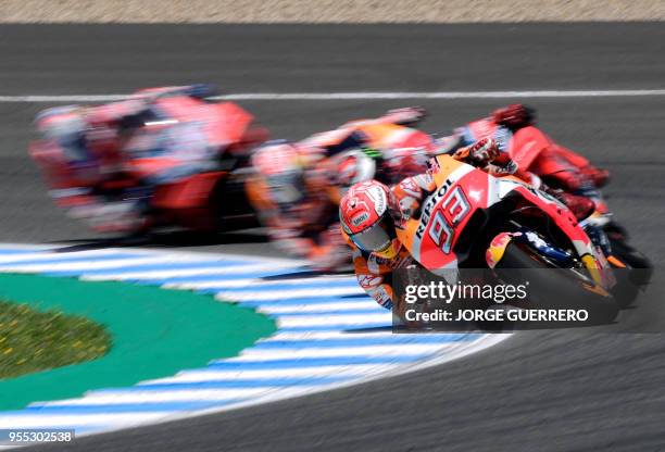 Repsol Honda Team's Spanish rider Marc Marquez competes during the MotoGP race of the Spanish Grand Prix at the Jerez Angel Nieto racetrack in Jerez...