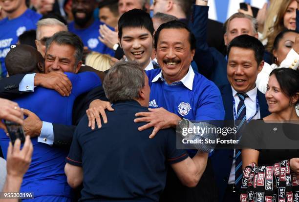 Neil Warnock, Manager of Cardiff City and Vincent Tan, Cardiff City owner celebrates gaining promotion to the premier league after the Sky Bet...