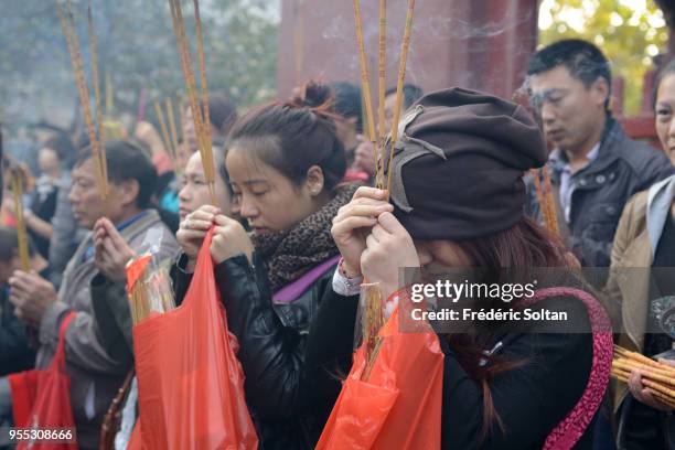 Yonghe Temple in Beijing. Chinese burn incense for good fortune at the Yonghe Temple, aka the 'Yonghe Lamasery', or, popularly, the "Lama Temple", a...