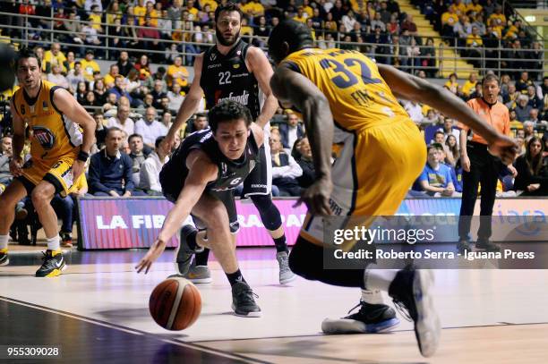 Alessandro Pajola and Stefano Gentile of Segafredo competes with Aleksander Vujacic and Trevor Mbakwe of Fiat during the LBA LegaBasket match between...