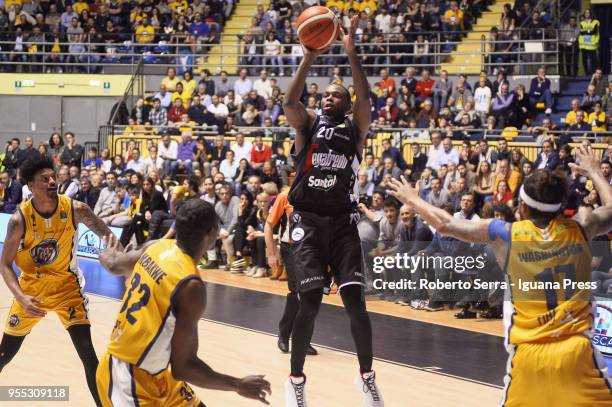 Oliver Lafayette of Segafredo competes with Diante Maurice Garrett and Trevor Mbakwe and Deron Washington of Fiat during the LBA LegaBasket match...