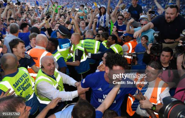 Cardiff captain Sean Morrison leaves the field congratulated by fans after the Sky Bet Championship match between Cardiff City and Reading at Cardiff...