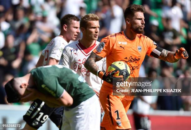 Bordeaux's French goalkeeper Benoit Costil reacts after stopping a penalty during the French L1 football match Saint-Etienne vs Bordeaux on May 6 at...