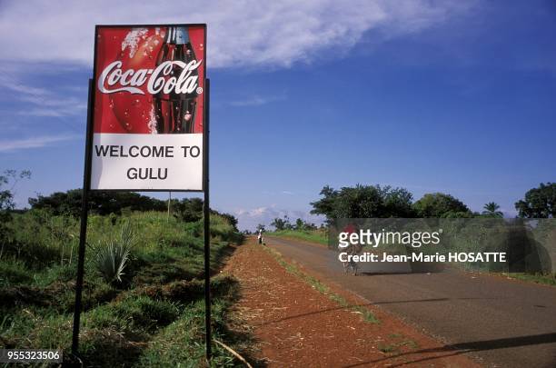 Advertising poster at the entrance of Gulu.