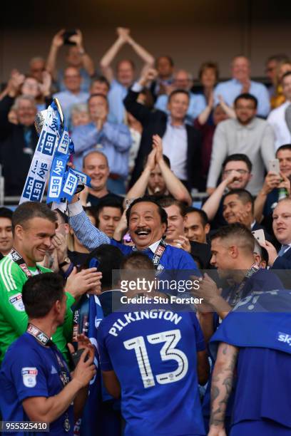 Cardiff owner Vincent Tan holds aloft the runners up trophy after the Sky Bet Championship match between Cardiff City and Reading at Cardiff City...