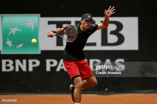 Ben McLachlan of Japan and Nicholas Monroe of USA in action against Dominic Inglot of Great Britain andi Robert Lindstedt of Sweden during TEB BNP...