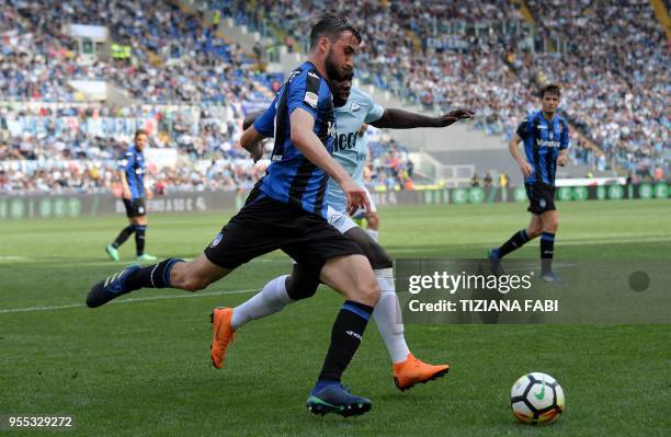 Lazio's midfielder from Italy Danilo Cataldi fights for the ball with Lazio's midfielder from Felipe Cacedo during the Serie A football match between...