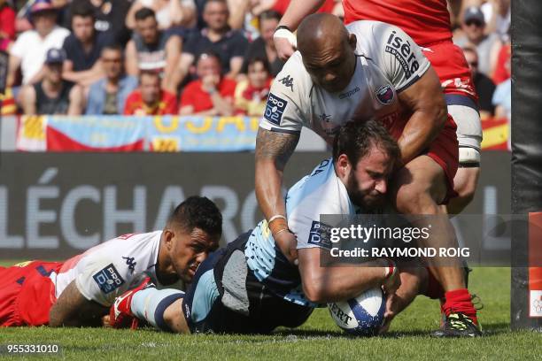 Perpignan's hooker Raphael Carbou scores a try during the French Rugby Union Pro D2 final match between Perpignan and Grenoble, at the Ernest Wallon...