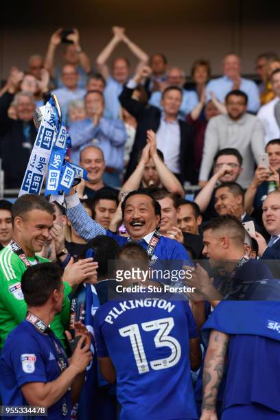 Cardiff owner Vincent Tan holds aloft the runners up trophy after the Sky Bet Championship match between Cardiff City and Reading at Cardiff City...