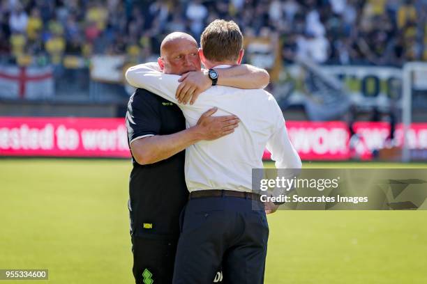 Assistant trainer Dirk Heesen of ADO Den Haag, coach Alfons Groenendijk of ADO Den Haag celebrate the victory and the qualification for the Play Offs...