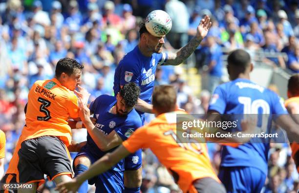 Cardiff City's Sean Morrison heads towards goal during the Sky Bet Championship match between Cardiff City and Reading at Cardiff City Stadium on May...