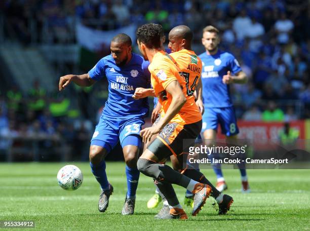 Cardiff City's Junior Hoilett battles with Reading's Sone Aluko during the Sky Bet Championship match between Cardiff City and Reading at Cardiff...