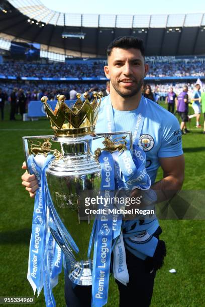 Sergio Aguero of Manchester City celebrate with The Premier League Trophy after the Premier League match between Manchester City and Huddersfield...
