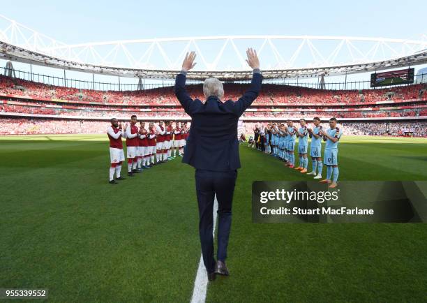 Arsene Wenger walks out for the last time at Emirates stadium as Arsenal manager before the Premier League match between Arsenal and Burnley at...