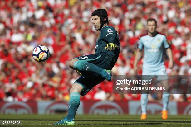 Arsenal's Czech goalkeeper Petr Cech kicks the ball up-field during the English Premier League football match between Arsenal and Burnley at the...