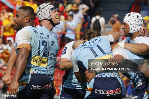 Perpignan's players celebrate at the end of the French Rugby Union Pro D2 final match between Perpignan and Grenoble, at the Ernest Wallon Stadium in...