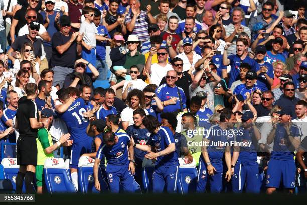 Olivier Giroud of Chelsea celebrates after scoring hi sides first goal wuth David Luiz of Chelsea during the Premier League match between Chelsea and...