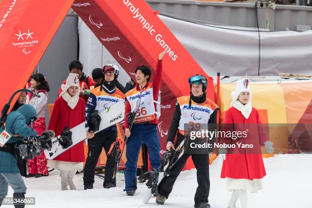 Silver Medalist Evan Strong of the United States, Gold Medalist Grimu Narita of Japan and Bronze Medalist Matti SUUR-HAMARI of Finland celebrate...