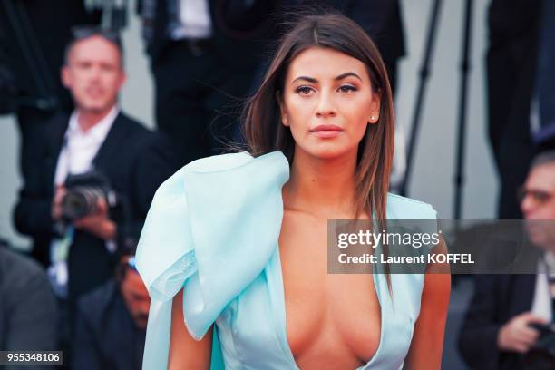 Guest walks the red carpet ahead of the 'Suburbicon' screening during the 74th Venice Film Festival at Sala Grande on September 2, 2017 in Venice,...