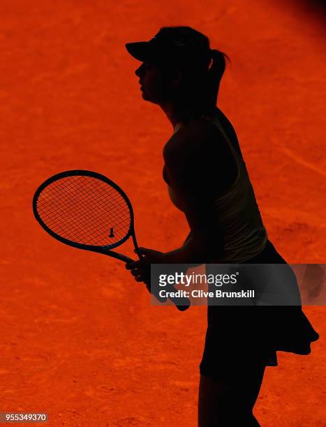 Maria Sharapova of Russia in action against Mihaela Buzarnescu of Romania in their first round match during day two of the Mutua Madrid Open tennis...