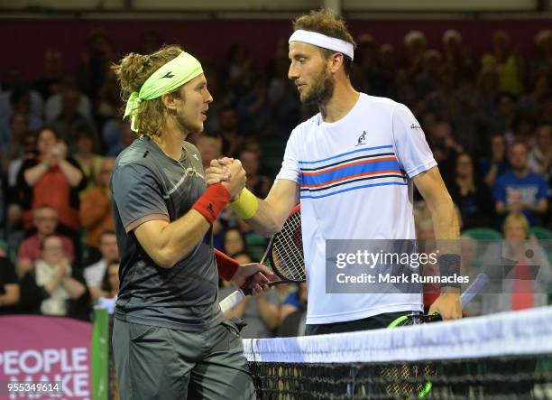 Lukas Lacko , of Slovakia is congratulated by Luca Vanni of Italy at match point in the singles final of The Glasgow Trophy at Scotstoun Leisure...