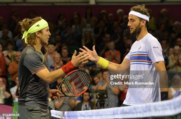 Lukas Lacko , of Slovakia is congratulated by Luca Vanni of Italy at match point in the singles final of The Glasgow Trophy at Scotstoun Leisure...