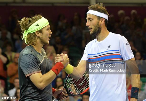 Lukas Lacko , of Slovakia is congratulated by Luca Vanni of Italy at match point in the singles final of The Glasgow Trophy at Scotstoun Leisure...