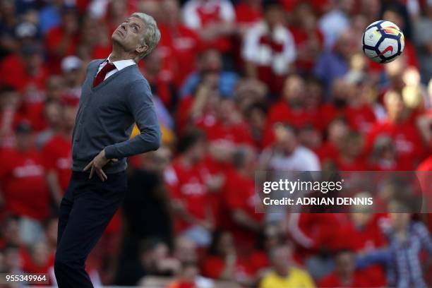 Arsenal's French manager Arsene Wenger gestures on the touchline during the English Premier League football match between Arsenal and Burnley at the...